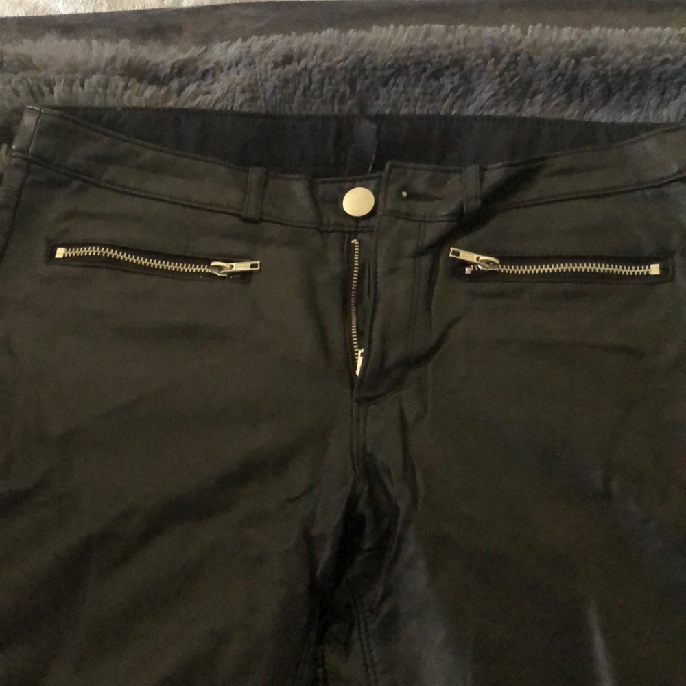 Black leather skinny pants. By H&M